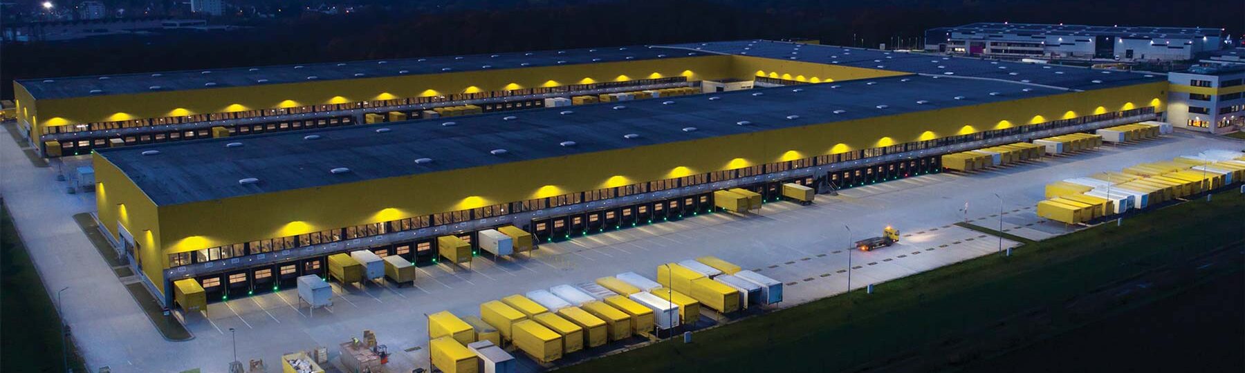 An aerial photo of the exterior of a large warehouse