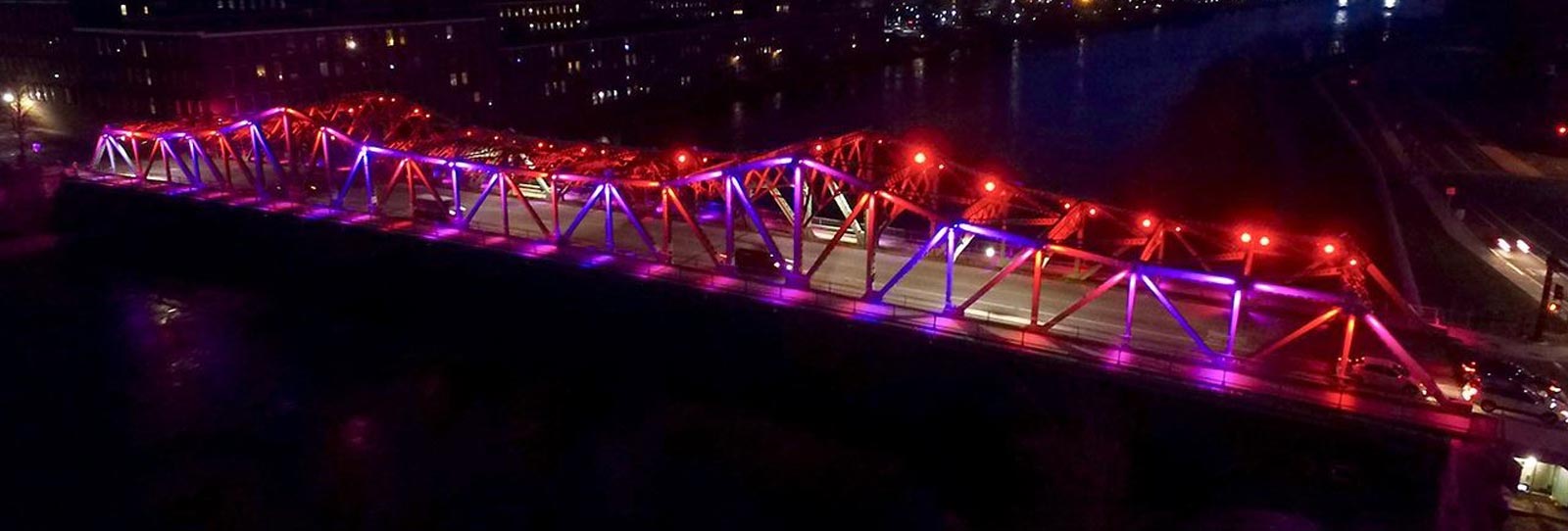 A fully lit bridge after dark